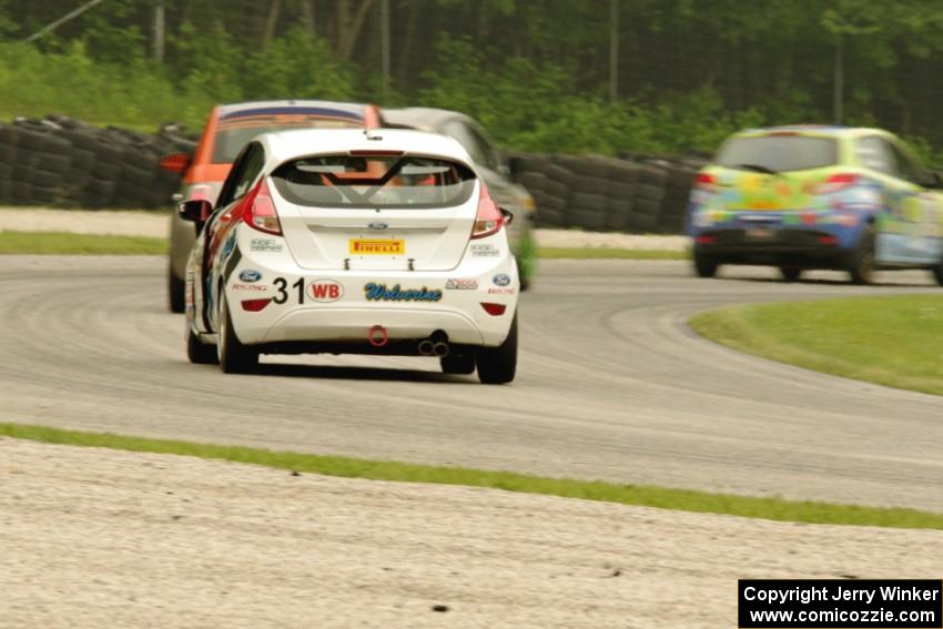 Michael Ashby's Mazda 2 ahead of Nate Stacy's Ford Fiesta, Austin Snader's Fiat 500 and Chris Capaldi's Ford Fiesta