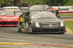 Andy Pilgrim's Cadillac CTS-V R, Anthony Lazzaro's Ferrari 458 Italia GT3 with Andrew Palmer's and Mike Skeen's Audi R8 Ultras