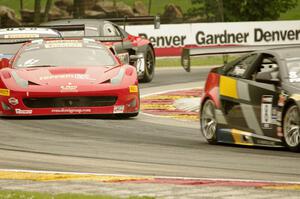 Andy Pilgrim's Cadillac CTS-V R, Anthony Lazzaro's Ferrari 458 Italia GT3 with Andrew Palmer's and Mike Skeen's Audi R8 Ultras