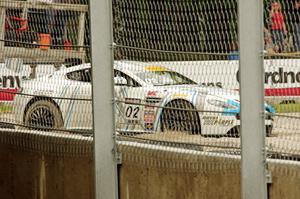 Drew Regitz's Aston Martin Vantage GT4 is stuck in the gravel at turn 6.