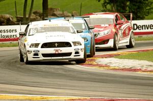 Dean Martin's Ford Mustang Boss 302S, Tony Buffomante's Ford Mustang Boss 302S and Mark Wilkins' Kia Optima