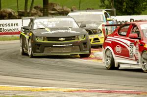 Mark Wilkins' Kia Optima, Lawson Aschenbach's Chevy Camaro and Jack Roush, Jr.'s Ford Mustang Boss 302S