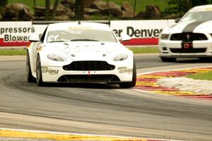 Jorge De La Torre's Aston Martin Vantage GT4 and Chris Outzen's Ford Mustang Boss 302S