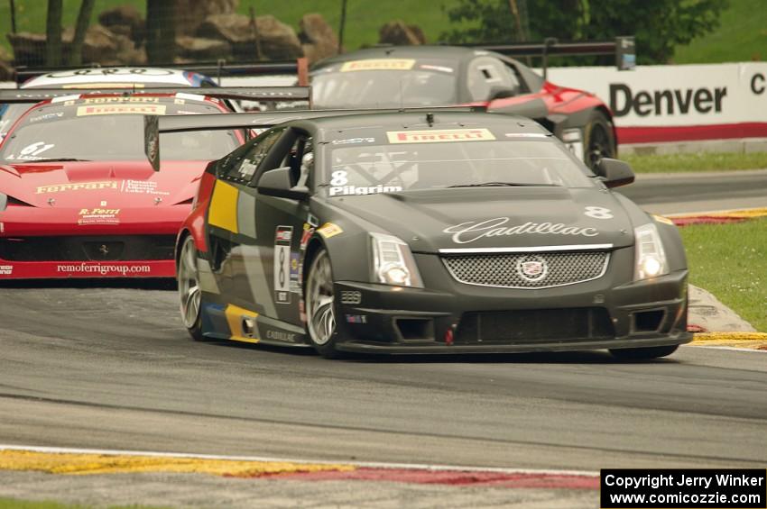 Andy Pilgrim's Cadillac CTS-V R, Anthony Lazzaro's Ferrari 458 Italia GT3 with Andrew Palmer's and Mike Skeen's Audi R8 Ultras