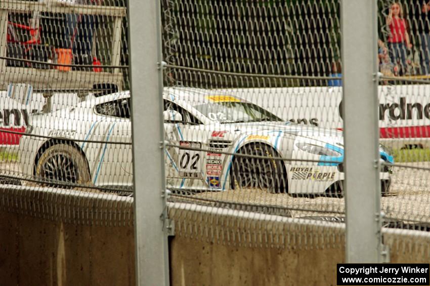 Drew Regitz's Aston Martin Vantage GT4 is stuck in the gravel at turn 6.