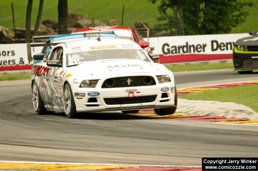 Dean Martin's Ford Mustang Boss 302S, Tony Buffomante's Ford Mustang Boss 302S and Mark Wilkins' Kia Optima