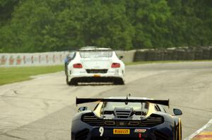 Alex Figge's McLaren 12C GT3 chases Butch Leitzinger's Bentley Continental GT3