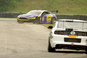 Mark Klenin's Aston Martin Vantage GT4 spins before turn 7.