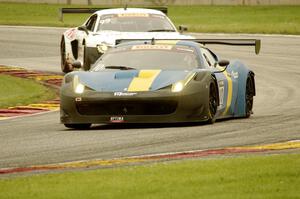 Henrik Hedman's Ferrari 458 Italia GT3 and Jeff Courtney's Audi R8 Ultra