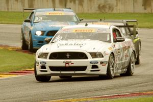 Dean Martin's Ford Mustang Boss 302S, Lawson Aschenbach's Chevy Camaro and Tony Buffomante's Ford Mustang Boss 302S