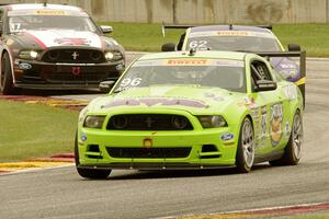 Brad Adams' Ford Mustang Boss 302S, Mark Klenin's Aston Martin Vantage GT4 and Alec Udell's Ford Mustang Boss 302S