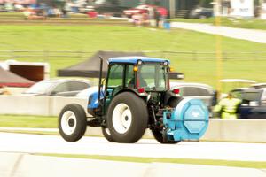 A clean-up vehicle is dispatched to the turn two area.