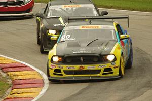 Jack Roush, Jr.'s Ford Mustang Boss 302S and Lawson Aschenbach's Chevy Camaro