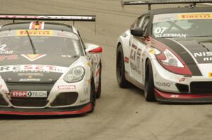 Buz McCall's Porsche Cayman S gets the inside line on Brian Kleeman's Nissan 370Z