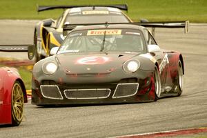 Tim Bergmeister's Porsche GT3R and Alex Figge's McLaren 12C GT3