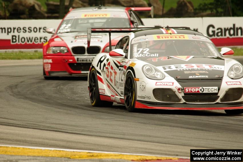 Buz McCall's Porsche Cayman S and Larry Funk's BMW M3