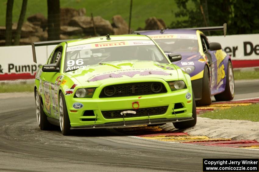 Brad Adams' Ford Mustang Boss 302S and Mark Klenin's Aston Martin Vantage GT4