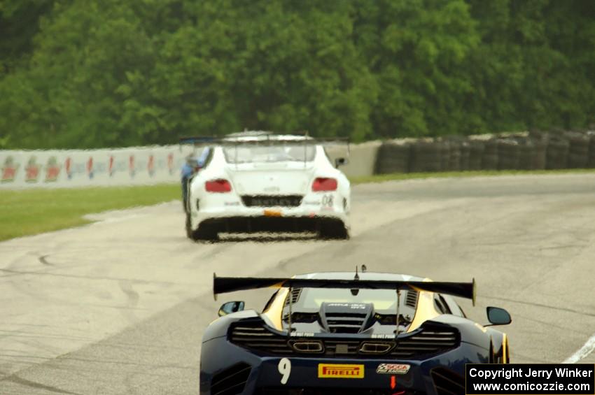 Alex Figge's McLaren 12C GT3 chases Butch Leitzinger's Bentley Continental GT3