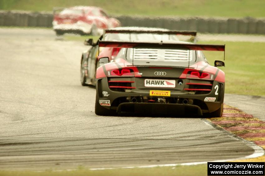 Mike Skeen's Audi R8 Ultra chases Andy Pilgrim's Cadillac CTS-V R
