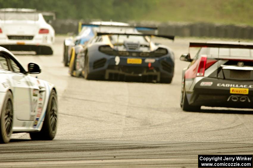 Butch Leitzinger's Bentley Continental GT3, James Sofronas' Audi R8 Ultra, Alex Figge's McLaren 12C GT3 and Johnny O'Connell's