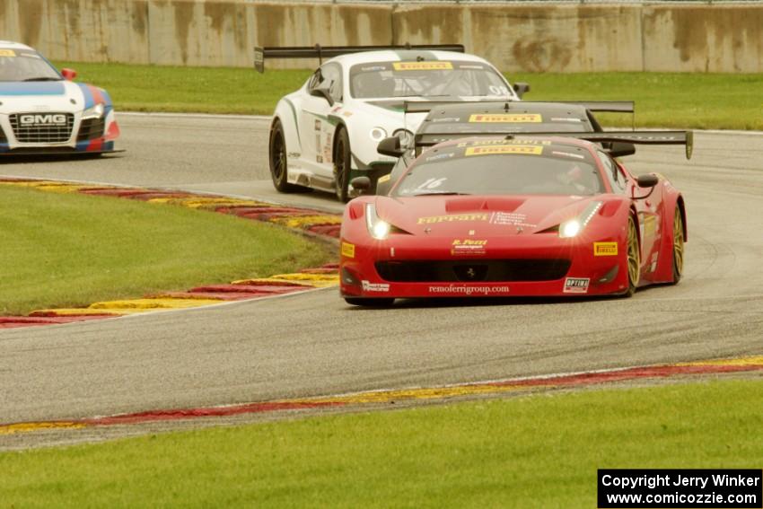 Nick Mancuso's Ferrari 458 Italia GT3, Johnny O'Connell's Cadillac CTS-V R, and Andrew Palmer's Audi R8 Ultra