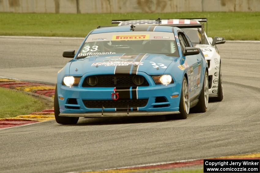 Tony Buffomante's Ford Mustang Boss 302S and Andy Lee's Chevy Camaro