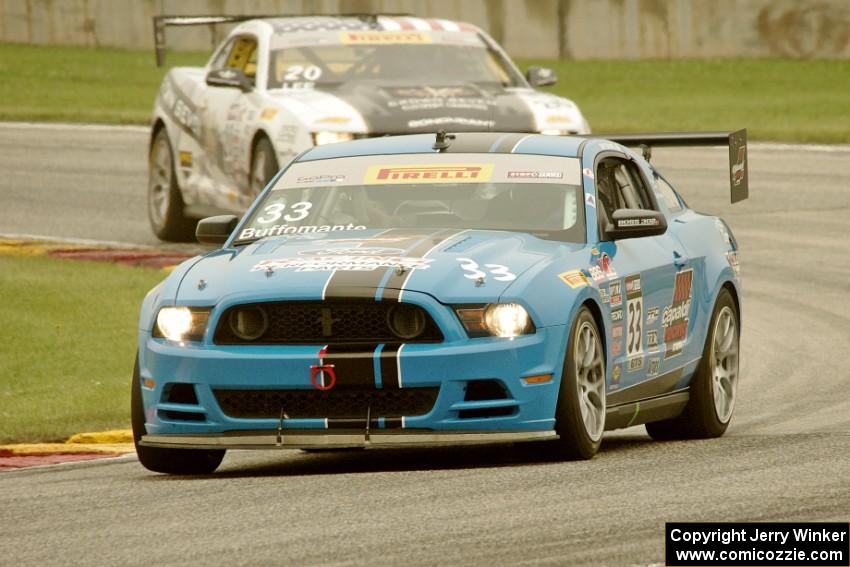 Tony Buffomante's Ford Mustang Boss 302S and Andy Lee's Chevy Camaro