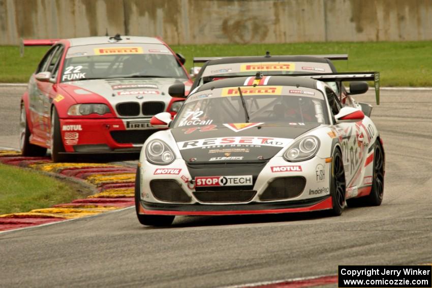 Buz McCall's Porsche Cayman S, Brian Kleeman's Nissan 370Z and Larry Funk's BMW M3