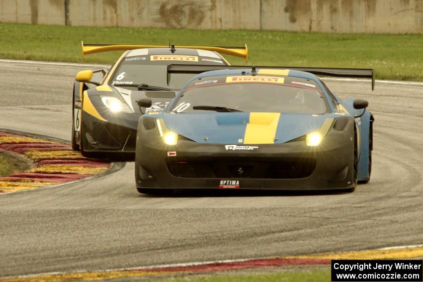 Henrik Hedman's Ferrari 458 Italia GT3 and Robert Thorne's McLaren 12C GT3