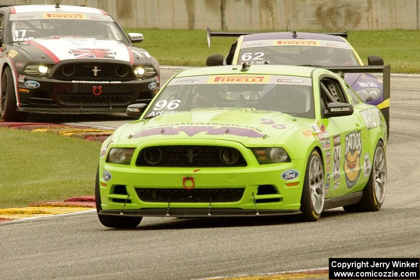 Brad Adams' Ford Mustang Boss 302S, Mark Klenin's Aston Martin Vantage GT4 and Alec Udell's Ford Mustang Boss 302S