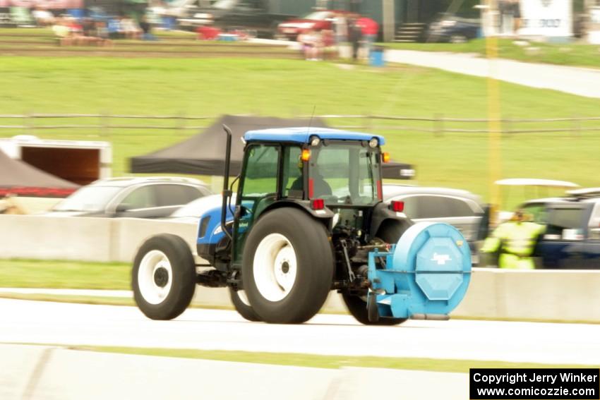 A clean-up vehicle is dispatched to the turn two area.