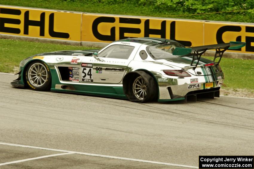 Tim Pappas' Mercedes-AMG SLS GT3 limps back to the pits after getting a flat.