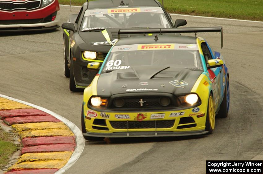 Jack Roush, Jr.'s Ford Mustang Boss 302S and Lawson Aschenbach's Chevy Camaro