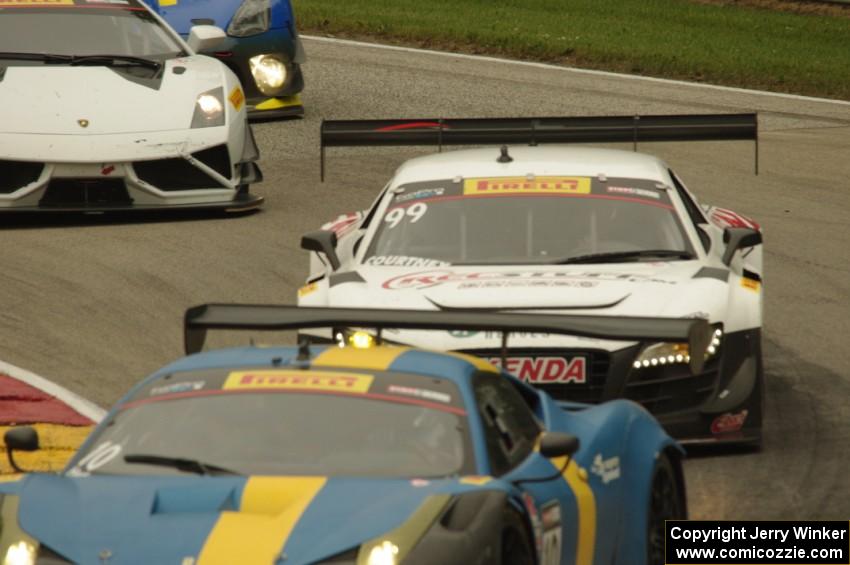 Henrik Hedman's Ferrari 458 Italia GT3 and Jeff Courtney's Audi R8 Ultra