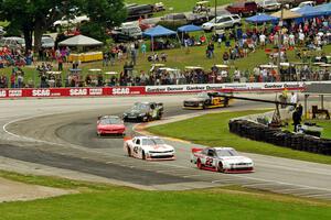 The front of the field at turn 5 on the pace lap.