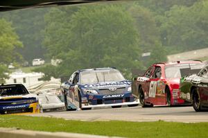 Chris Buescher's Ford Mustang, Elliott Sadler's Toyota Camry and Chase Elliott's Chevy Camaro