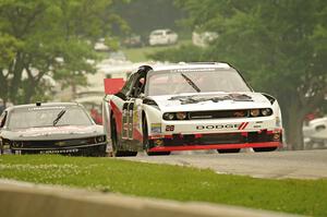 J.J. Yeley's Dodge Challenger and Landon Cassill's Chevy Camaro