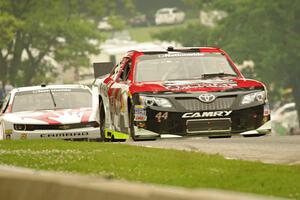 Carlos Contreras' Toyota Camry and Kevin O'Connell's Chevy Camaro