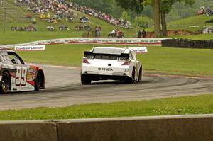 Mike Bliss' Toyota Camry and James Buescher's Toyota Camry