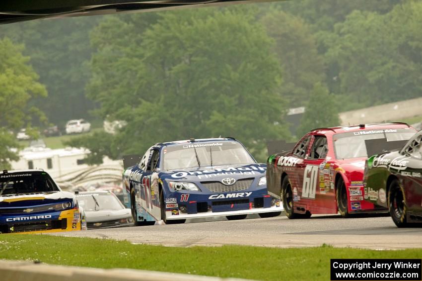 Chris Buescher's Ford Mustang, Elliott Sadler's Toyota Camry and Chase Elliott's Chevy Camaro