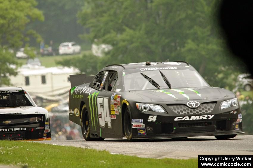 Sam Hornish, Jr.'s Toyota Camry and Brendan Gaughan's Chevy Camaro