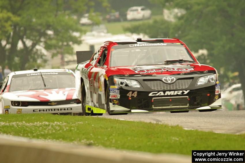 Carlos Contreras' Toyota Camry and Kevin O'Connell's Chevy Camaro
