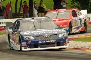 Elliott Sadler's Toyota Camry and Ryan Reed's Ford Mustang