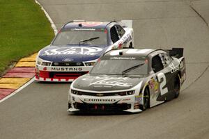 Brian Scott's Chevy Camaro and Trevor Bayne's Ford Mustang