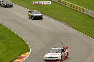 Alex Tagliani's Dodge Challenger, Bobby Reuse's Chevy Camaro and Sam Hornish, Jr.'s Toyota Camry