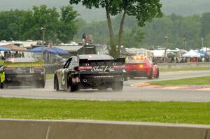 Justin Marks' Chevy Camaro and Brian Scott's Chevy Camaro behind the pace car