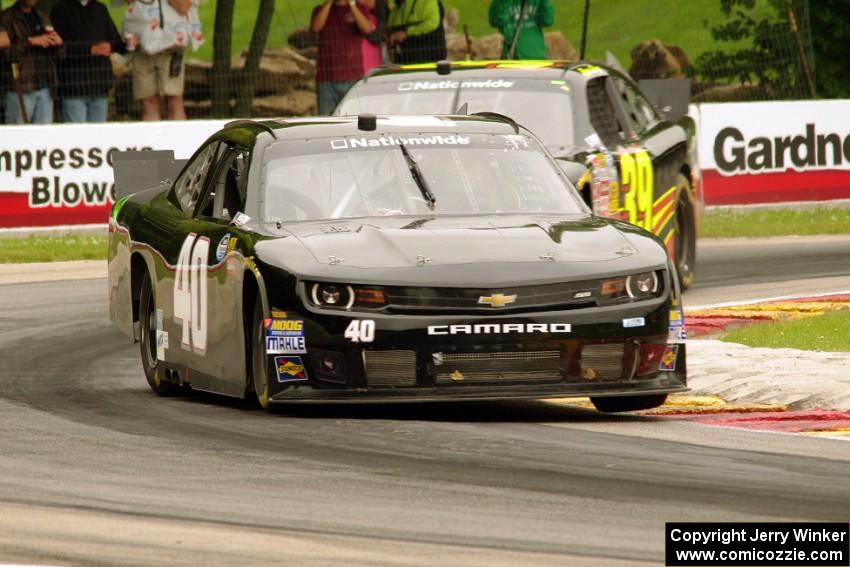 Matt DiBenedetto's Chevy Camaro and Ryan Sieg's Chevy Camaro