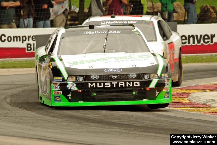 Dakoda Armstrong's Ford Mustang and Tommy Joe Martins' Dodge Challenger