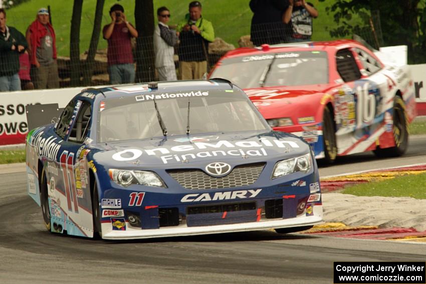 Elliott Sadler's Toyota Camry and Ryan Reed's Ford Mustang