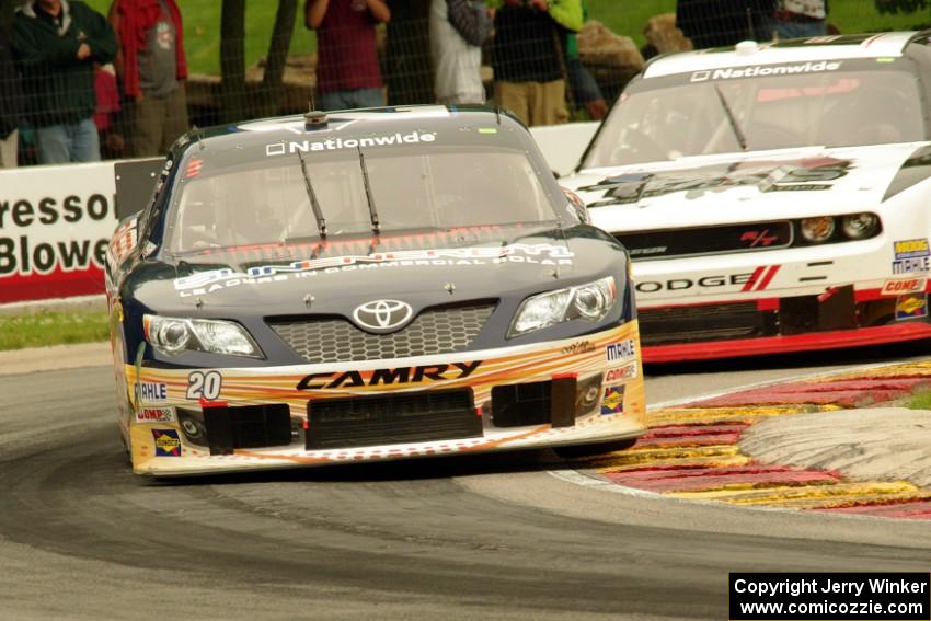 Kenny Habul's Toyota Camry and J.J. Yeley's Dodge Challenger